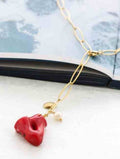 Collar de acero y coral de resina